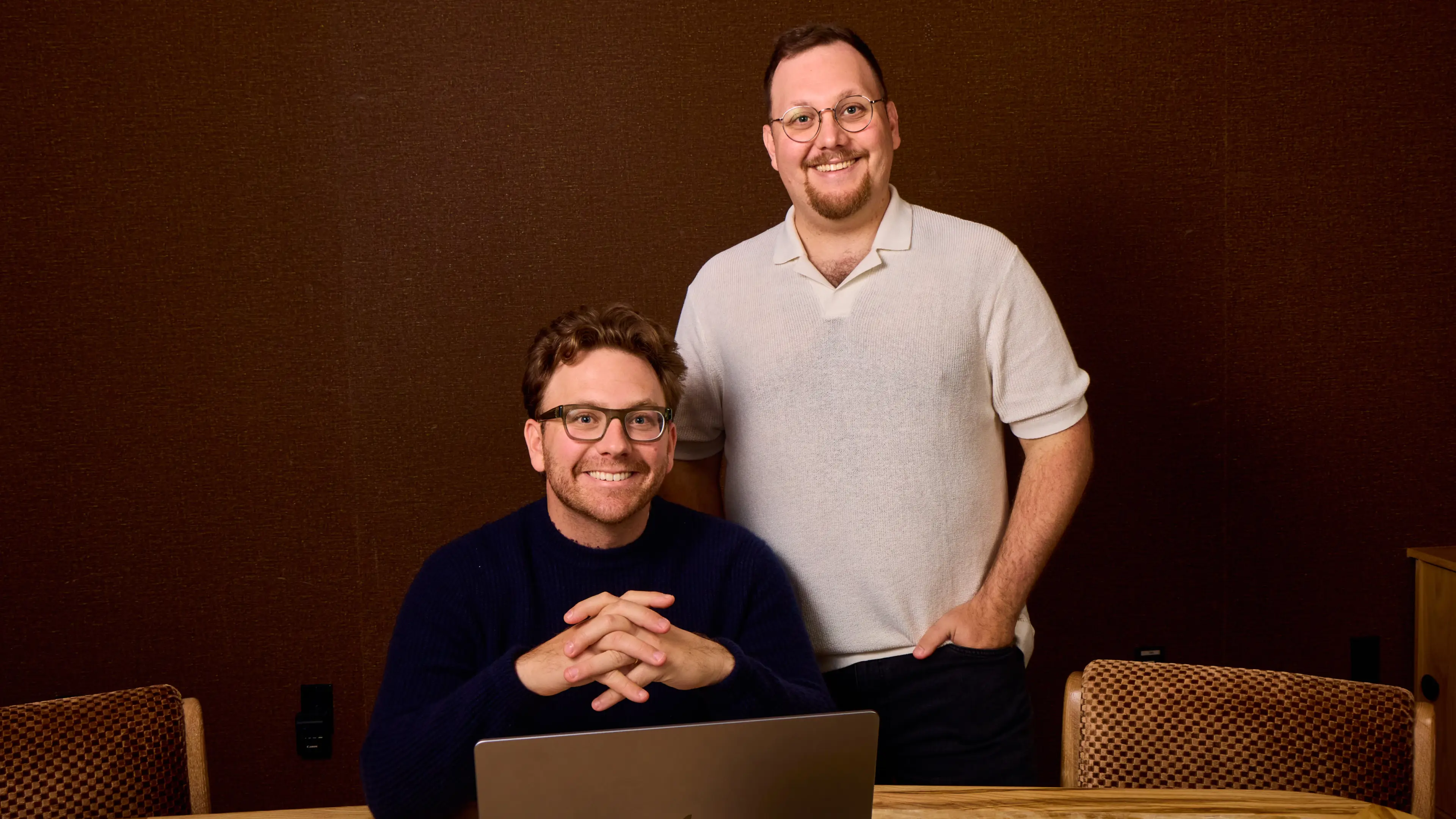 Matt Basile, seated, and Nick Basile, standing, the co-founders of Good Measure